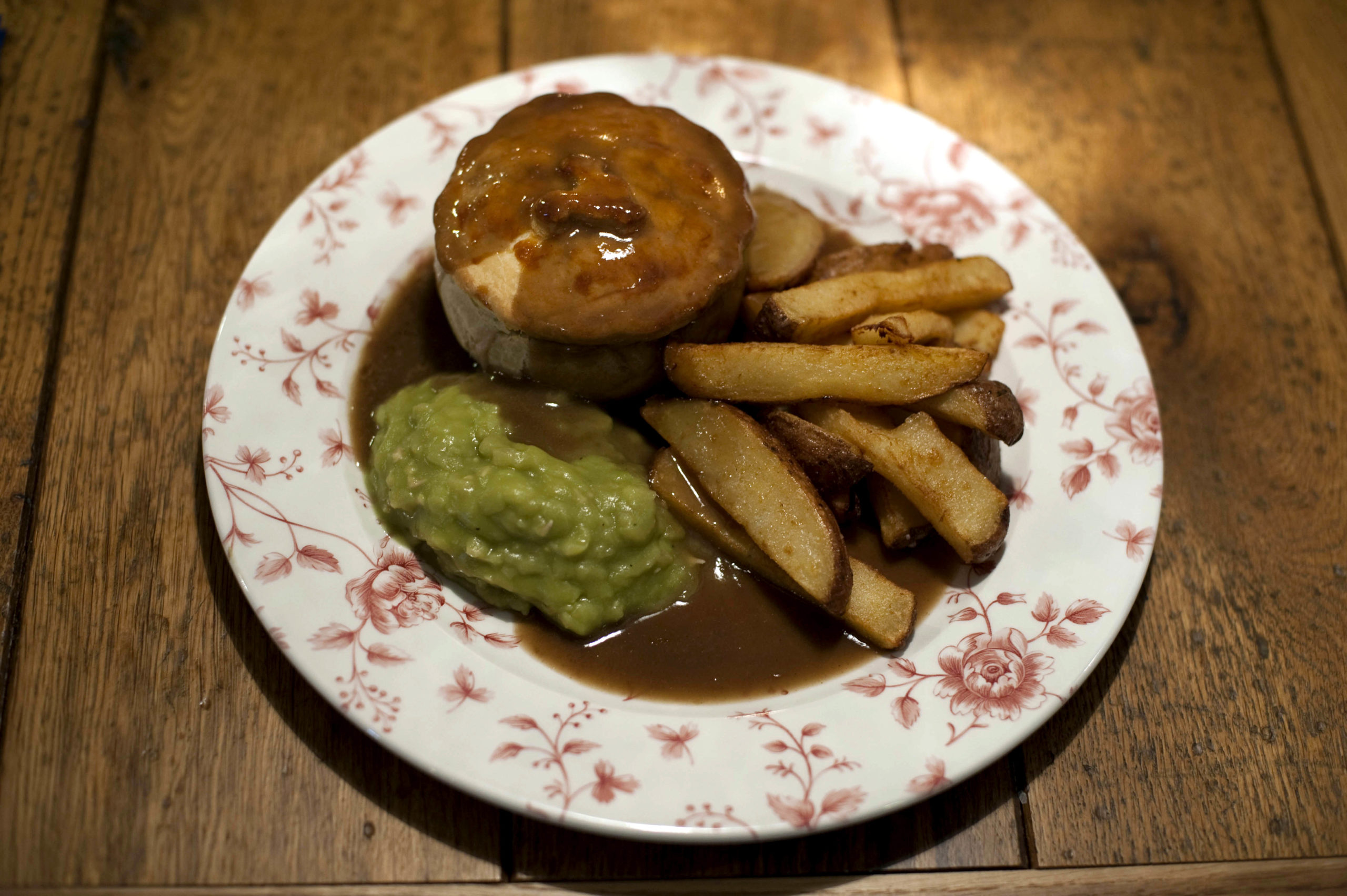 British Oak pie, chips and peas